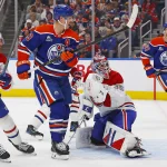 23 octobre 2025; Edmonton, Alberta, Canada; L'attaquant des Oilers d'Edmonton, Ryan Nugent-Hopkins (93), marque un but contre le gardien des Canadiens de Montréal, Sam Montembeault (35), au cours de la troisième période au Rogers Place.