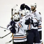June 14, 2006; Raleigh, NC, USA; Edmonton Oilers defensemen (44) Chris Pronger is congratulated by teammates after scoring the 1st goal of the game during the 1st period in game 5 of the NHL Stanley Cup Finals at the RBC Center. Mandatory Credit: James Guillory-USA TODAY Sports Copyright (c) 2006 James Guillory