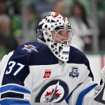 Feb 2, 2026; Dallas, Texas, USA; Winnipeg Jets goaltender Connor Hellebuyck (37) faces the Dallas Stars attack during the second period at the American Airlines Center.