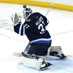 The Oilers suddenly have a fascinating option after Connor Hellebuyck wants out of Winnipeg Apr 6, 2026; Winnipeg, Manitoba, CAN; Winnipeg Jets goaltender Connor Hellebuyck (37) takes a puck off his mask in a game against the Seattle Kraken in the first period at Canada Life Centre. Mandatory Credit: James Carey Lauder-Imagn Images