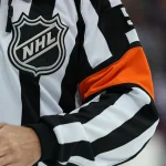 Oct 20, 2018; Columbus, OH, USA; A view of the NHL shield logo on the jersey of an official in the game of the Chicago Blackhawks against the Columbus Blue Jackets at Nationwide Arena.