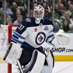 Feb 2, 2026; Dallas, Texas, USA; Winnipeg Jets goaltender Connor Hellebuyck (37) faces the Dallas Stars attack during the second period at the American Airlines Center