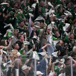 Apr 20, 2026; Dallas, Texas, USA; The Dallas Stars fans celebrate during the game between the Stars and the Wild in game two of the first round of the 2026 Stanley Cup Playoffs at American Airlines Center.