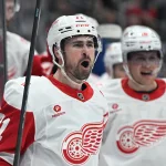 Jan 21, 2026; Toronto, Ontario, CAN; Detroit Red Wings forward Dylan Larkin (71) celebrates aftert scoring the winning goal in overtime against the Toronto Maple Leafs at Scotiabank Arena. :