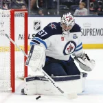 Apr 4, 2026; Columbus, Ohio, USA; Winnipeg Jets goalie Connor Hellebuyck (37) makes a save against the Columbus Blue Jackets during the second period at Nationwide Arena.