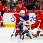 Connor McDavid's viral trade proposal has Red Wings giving up 4 core players and 4 draft picks Oct 19, 2025; Detroit, Michigan, USA; Edmonton Oilers center Connor McDavid (97) plays the puck from his knees against Detroit Red Wings defenseman Moritz Seider (53) during the first period at Little Caesars Arena. Mandatory Credit: Rick Osentoski-Imagn Images