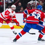 Red Wings receive aggressive five-piece return haul from the Canadiens for Dylan Larkin in trade proposal Jan 10, 2026; Montreal, Quebec, CAN; Detroit Red Wings center Dylan Larkin (71) plays the puck against Montreal Canadiens defenseman Noah Dobson (53) during the second period at Bell Centre. Mandatory Credit: David Kirouac-Imagn Images