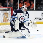 Feb 27, 2026; Anaheim, California, USA; Winnipeg Jets goaltender Connor Hellebuyck (37) warms up before the game against the Anaheim Ducks at Honda Center.