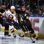Mar 26, 1998; Uniondale, NY, USA; FILE PHOTO; Pittsburgh Penguins right wing Jaromir Jagr (68) and Stu Barnes (14) in action against New York Islanders right wing Mariusz Czerkawski (25) at Nassau Coliseum.