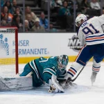 Apr 8, 2023; San Jose, California, USA; San Jose Sharks goaltender James Reimer (47) defends against Edmonton Oilers left wing Evander Kane (91) during the third period at SAP Center at San Jose. Mandatory Credit: Stan Szeto-USA TODAY Sports