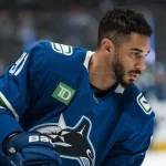 Jan 27, 2026; Vancouver, British Columbia, CAN; Vancouver Canucks forward Evander Kane (91) skates in warm up prior to a game against the San Jose Sharks at Rogers Arena.