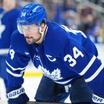 Jan 10, 2026; Toronto, Ontario, CAN; Toronto Maple Leafs center Auston Matthews (34) waits for the faceoff against the Vancouver Canucks during the first period at Scotiabank Arena.