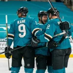 Apr 6, 2021; San Jose, California, USA; San Jose Sharks center Patrick Marleau (12) and San Jose Sharks left wing Evander Kane (9) and teammates celebrate after the goal during the second period against the Anaheim Ducks at SAP Center at San Jose. Mandatory Credit: Neville E. Guard-USA TODAY Sports