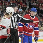18 mars 2025; Montréal, Québec, Canada; Ridly Greig (71), attaquant des Sénateurs d'Ottawa, et Patrik Laine (92), attaquant des Canadiens de Montréal, échangent des mots durant la première période au Centre Bell.