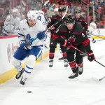 A major change is coming to local NHL broadcasts this season for six teams Dec 4, 2025; Raleigh, North Carolina, USA; Toronto Maple Leafs left wing Matthew Knies (23) skates with the puck past Carolina Hurricanes defenseman Mike Reilly (6) during the second period at Lenovo Center. Mandatory Credit: James Guillory-Imagn Images