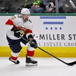 Dec 13, 2025; Dallas, Texas, USA; Florida Panthers left wing Brad Marchand (63) skates against the Dallas Stars during the game at the American Airlines Center.
