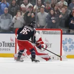 Dec 4, 2025; Columbus, Ohio, USA; Columbus Blue Jackets right wing Kirill Marchenko (86) scores during the shootout against the Detroit Red Wings at Nationwide Arena.