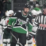 Apr 28, 2026; Dallas, Texas, USA; Dallas Stars left wing Jamie Benn (14) skates off the ice as the Minnesota Wild celebrate their win over the Stars in game five of the first round of the 2026 Stanley Cup Playoffs at American Airlines Center. :