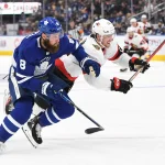 Controversial forward Alex Formenton emerges as a potential late offseason target for one Canadian team Oct 9, 2021; Toronto, Ontario, CAN; Toronto Maple Leafs defenseman Jake Muzzin (8) bodychecks Ottawa Senators forward Alex Formenton (10) in the first period at Scotiabank Arena. Mandatory Credit: Dan Hamilton-USA TODAY Sports
