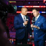 Jun 14, 2025; Edmonton, Alberta, CAN; Sportsnet host David Amber (left) and NHL Insider Elliotte Friedman (right) prior to the game between the Edmonton Oilers and the Florida Panthers in game five of the 2025 Stanley Cup Final at Rogers Place.