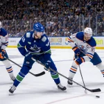 Elias Pettersson to Oilers? Blockbuster and viral Canucks trade proposal is turning heads May 16, 2024; Vancouver, British Columbia, CAN; Edmonton Oilers forward Leon Draisaitl (29) watches as forward Connor McDavid (97) stick checks Vancouver Canucks forward Elias Pettersson (40) during the third period in game five of the second round of the 2024 Stanley Cup Playoffs at Rogers Arena. Mandatory Credit: Bob Frid-USA TODAY Sports