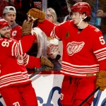 Mar 6, 2026; Detroit, Michigan, USA; Detroit Red Wings right wing Alex DeBrincat (93) receives congratulations from defenseman Moritz Seider (53) after scoring in the second period against the Florida Panthers at Little Caesars Arena. :