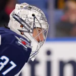 Dec 5, 2024; Buffalo, New York, USA; Winnipeg Jets goaltender Connor Hellebuyck (37) looks for the puck during the second period against the Buffalo Sabres at KeyBank Center.