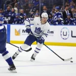 Feb 25, 2026; Tampa, Florida, USA; Toronto Maple Leafs forward Matthew Knies (23) handles the puck against the Tampa Bay Lightning during the second period at Benchmark International Arena.
