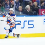Dec 13, 2025; Toronto, Ontario, CAN; Edmonton Oilers center Connor McDavid (97) celebrates scoring a goal against the Toronto Maple Leafs during the first period at Scotiabank Arena.