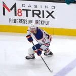 Apr 8, 2026; San Jose, California, USA; Edmonton Oilers center Connor McDavid (97) follows the puck during a game against the San Jose Sharks in the third period at SAP Center at San Jose.