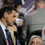 Jul 8, 2022; Montreal, Quebec, CANADA; Boston Bruins general manager Don Sweeney (left) and president Cam Neely discuss during the second round of the 2022 NHL Draft at the Bell Centre. Mandatory Credit: Eric Bolte-USA TODAY Sports