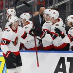 Jan 15, 2022; Edmonton, Alberta, CAN; Ottawa Senators forward Alex Formenton (10) celebrates a third period goal against the Edmonton Oilers at Rogers Place.