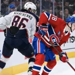 Échange: Don Waddell fait une annonce concernant Kirill Marchenko et le Canadien doit en profiter 16 novembre 2024 ; Montréal, Québec, Canada ; Le défenseur des Canadiens de Montréal, Lane Hutson (48), défend la rondelle face à l\'ailier droit des Blue Jackets de Columbus, Kirill Marchenko (86), au cours de la troisième période au Centre Bell.