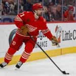 Jan 31, 2026; Detroit, Michigan, USA; Detroit Red Wings center Dylan Larkin (71) skates with the puck in the first period against the Colorado Avalanche at Little Caesars Arena.