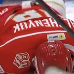 Alex Galchenyuk takes a puck off the face in the KHL