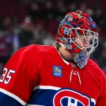 Feb 26, 2026; Montreal, Quebec, CAN; Montreal Canadiens goalie Samuel Montembeault (35) looks on during warm-up before the game against the New York Islanders at Bell Centre.