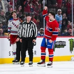 Jan 19, 2025; Montreal, Quebec, CAN; Montreal Canadiens defenseman Arber Xhekaj (72) reacts by raising his fist in the air after a fight with New York Rangers center Matt Rempe (73) during the second period at Bell Centre.