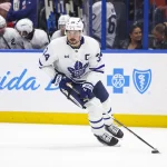Feb 25, 2026; Tampa, Florida, USA; Toronto Maple Leafs forward Auston Matthews (34) handles the puck against Tampa Bay Lightning during the third period at Benchmark International Arena.