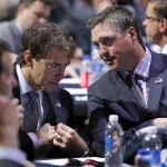 Jun 30, 2013; Newark, NJ, USA; Colorado Avalanche head coach Patrick Roy (right) talks with executive of hockey operations Joe Sakic (left) during the 2013 NHL Draft at the Prudential Center.