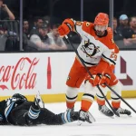 Mar 20, 2026; Salt Lake City, Utah, USA; Anaheim Ducks left wing Chris Kreider (20) skates around Utah Mammoth center Alexander Kerfoot (15) during the first period at Delta Center.