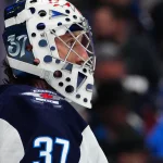 Mar 28, 2026; Denver, Colorado, USA; Winnipeg Jets goaltender Connor Hellebuyck (37) looks on during the second period against the Colorado Avalanche at Ball Arena.