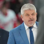 Feb 28, 2026; Raleigh, North Carolina, USA; Detroit Red Wings head coach Todd McLellan walks across the ice after their loss against the Carolina Hurricanes during the third period at Lenovo Center.