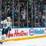 Jan 31, 2026; Vancouver, British Columbia, CAN; Toronto Maple Leafs forward Auston Matthews (34) celebrates his game winning shootout goal against the Vancouver Canucks at Rogers Arena.
