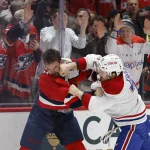 Jan 13, 2026; Washington, District of Columbia, USA; MontrŽal Canadiens defenseman Arber Xhekaj (72) fights Washington Capitals defenseman Dylan McIlrath (52) during the second period at Capital One Arena.