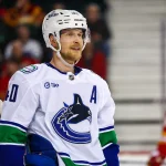 Mar 28, 2026; Calgary, Alberta, CAN; Vancouver Canucks center Elias Pettersson (40) skates against the Calgary Flames during the third period at Scotiabank Saddledome. Mandatory Credit: Sergei Belski-Imagn Images