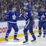 Mar 12, 2026; Toronto, Ontario, CAN; Toronto Maple Leafs forward Matthew Knies (23) and forward John Tavares (91) go to congratulate forward William Nylander (88) on a goal against the Anaheim Ducks during the third period at Scotiabank Arena. :