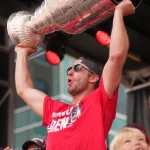 Jun 20, 2026; Raleigh, North Carolina, USA; Carolina Hurricanes center Jordan Staal (11) holds up the Stanley Cup Trophy during the Stanley Cup championship parade and rally at Raleigh.