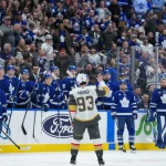 Jan 23, 2026; Toronto, Ontario, CAN; Vegas Golden Knights right wing Mitch Marner (93) acknowledges the crowd after a video board tribute during a TV timeout against the Toronto Maple Leafs in the first period at Scotiabank Arena.