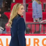 Dec 3, 2024; Raleigh, North Carolina, USA; Seattle Kraken assistant coach Jessica Campbell walks off the ice after their victory against the Carolina Hurricanes at Lenovo Center.