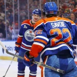 Mar 28, 2026; Edmonton, Alberta, CAN; The Edmonton Oilers celebrate a goal scored by forward Matt Savoie (22) during the third period against the Anaheim Ducks at Rogers Place.